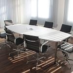 white wooden table with chairs set
